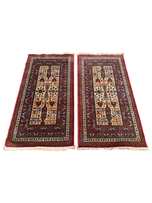 Paire de tapis de style oriental 140cm x 70cm