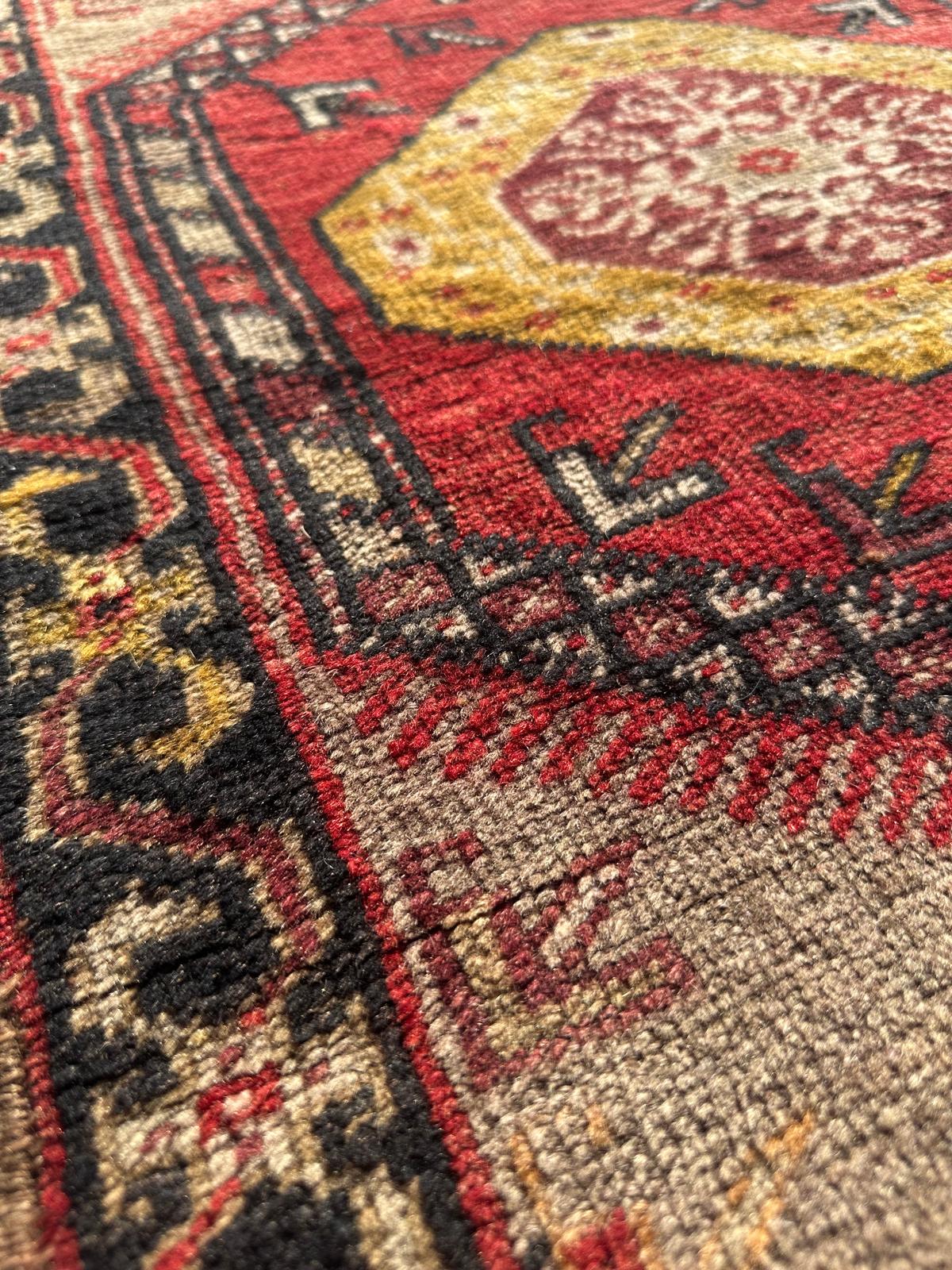 Petit tapis persan fait main 90cm x 60cm