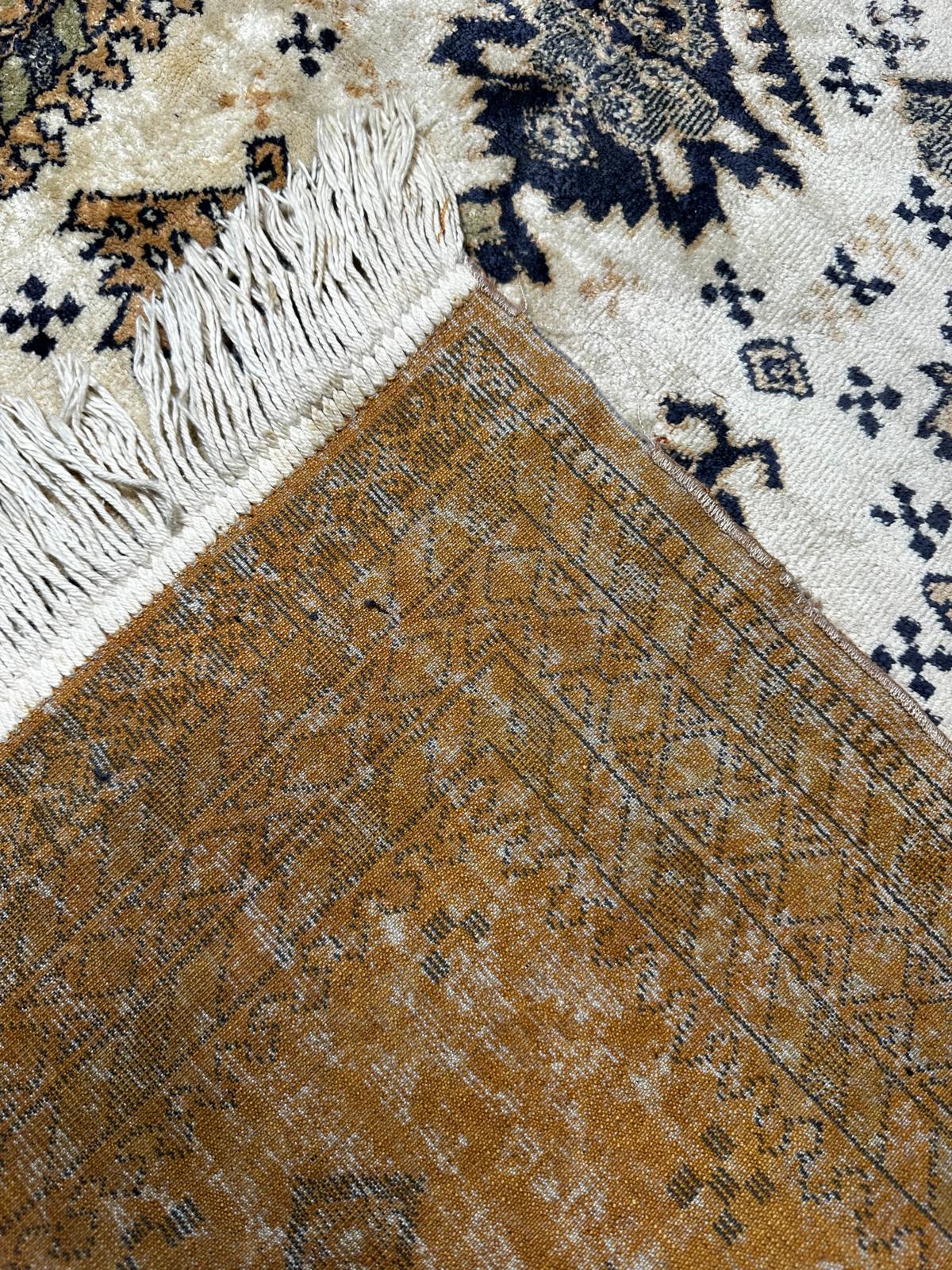 Tapis de style oriental 110cm x 70cm