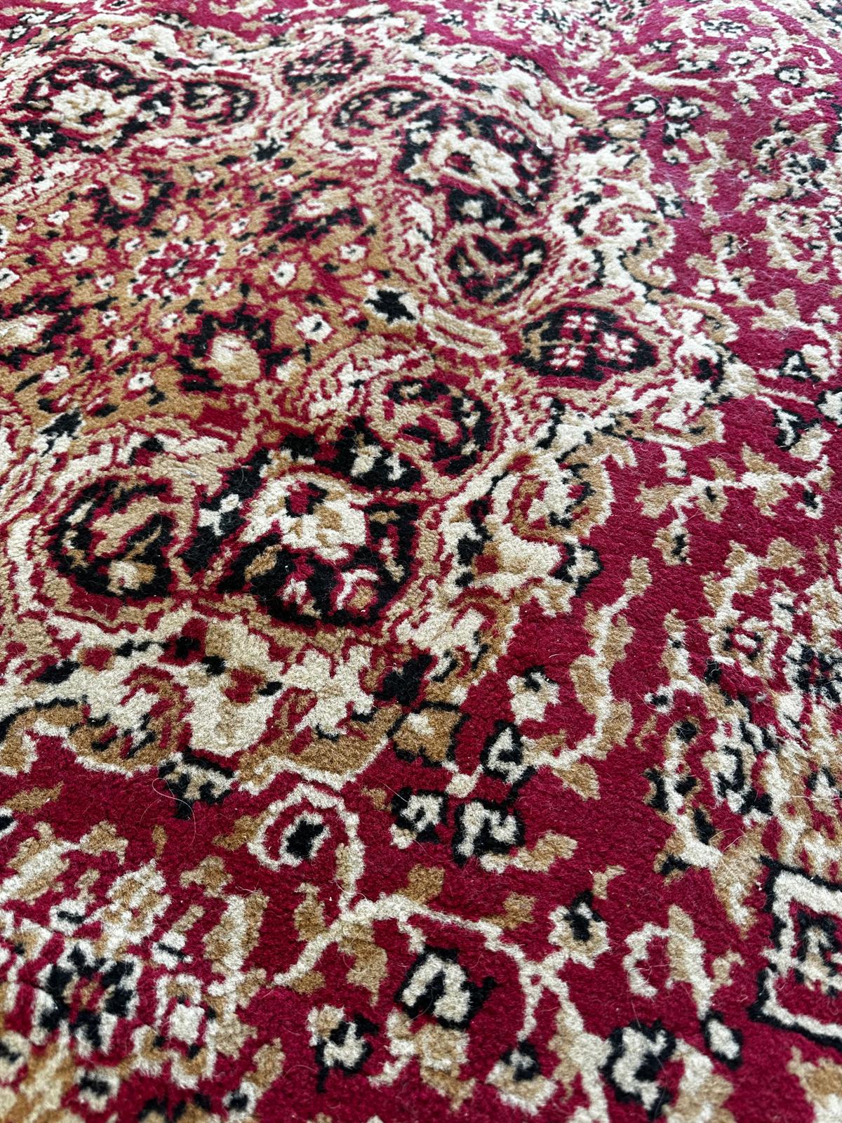 Tapis oriental octogonnal 190cm de diamètre