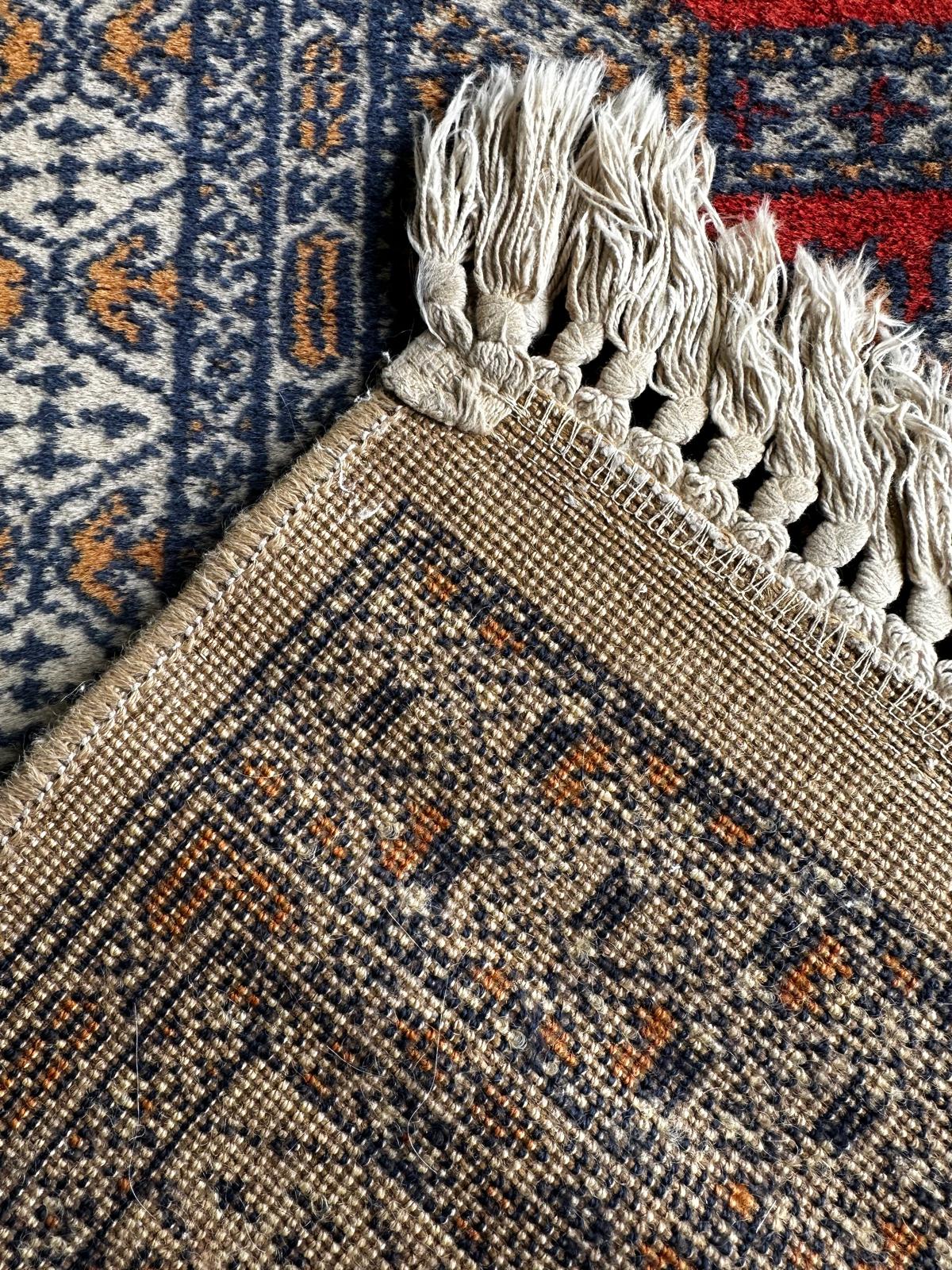 Tapis oriental 130cm x 60cm