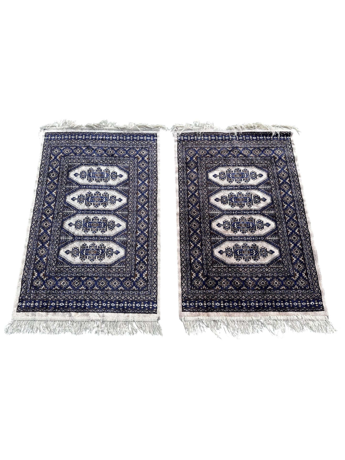 Paire de tapis de style oriental 110cm x 66cm