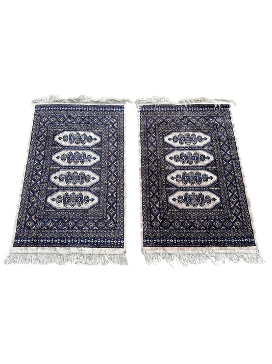 Paire de tapis de style oriental 110cm x 66cm