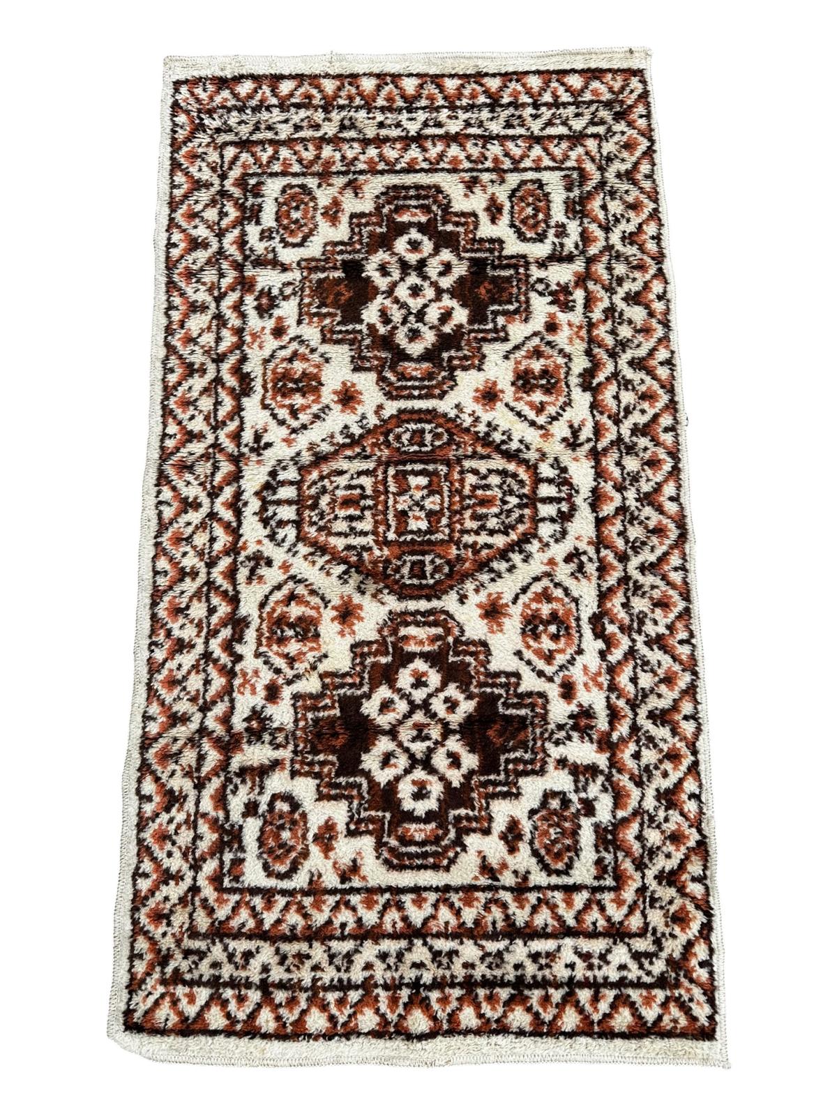 Paire de tapis de style oriental 120cm x 60cm
