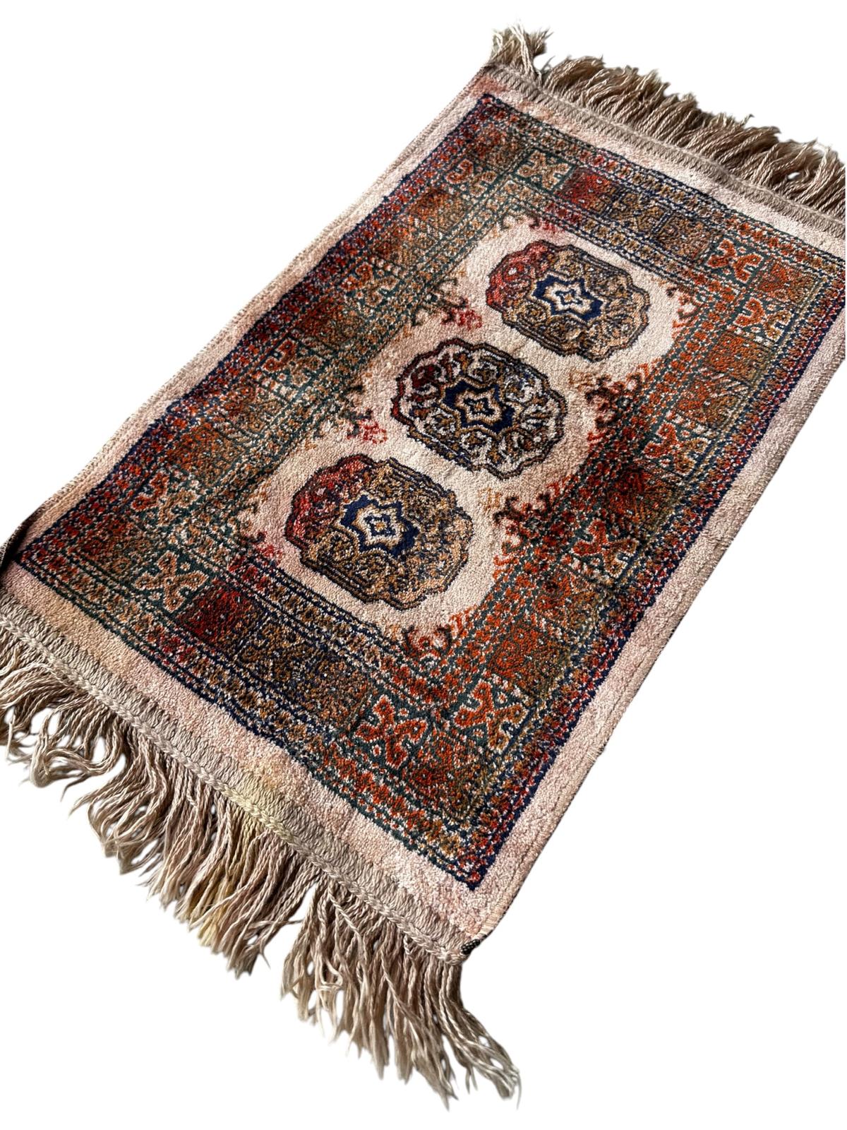 Tapis de style oriental 55cm x 34cm