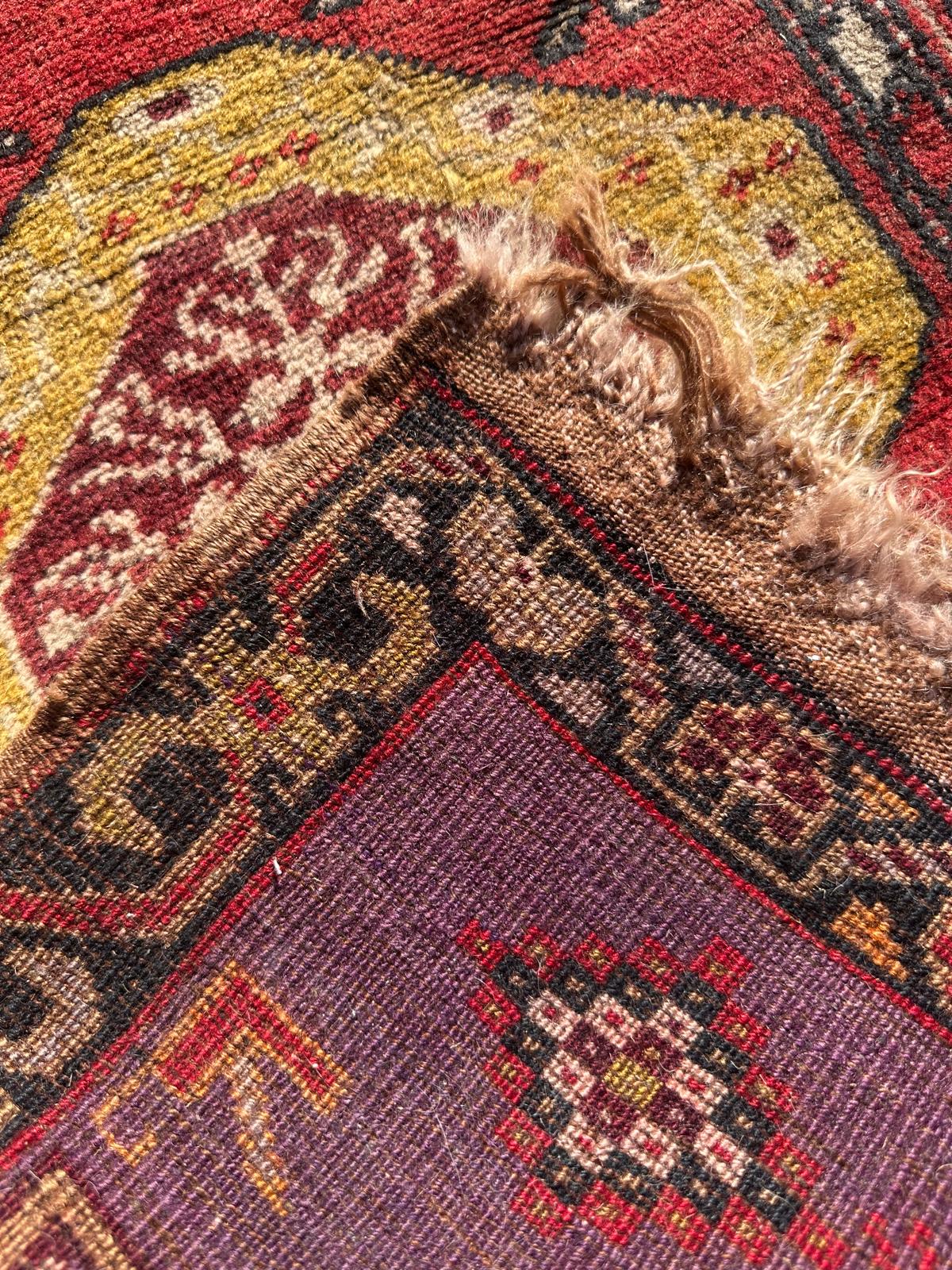 Petit tapis persan fait main 90cm x 60cm
