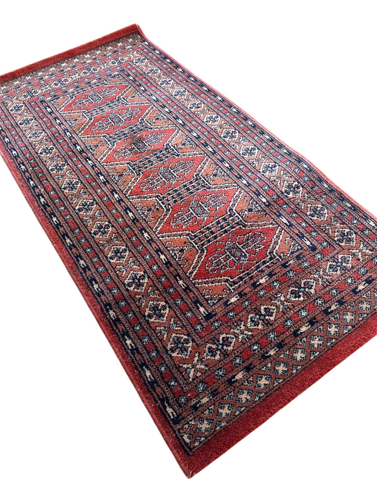 Tapis oriental 120cm x 60cm