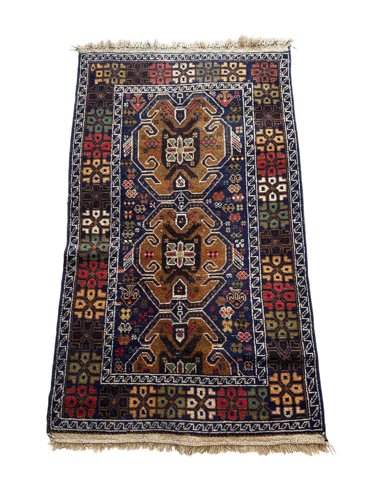Tapis oriental fait main 160cm x 90cm