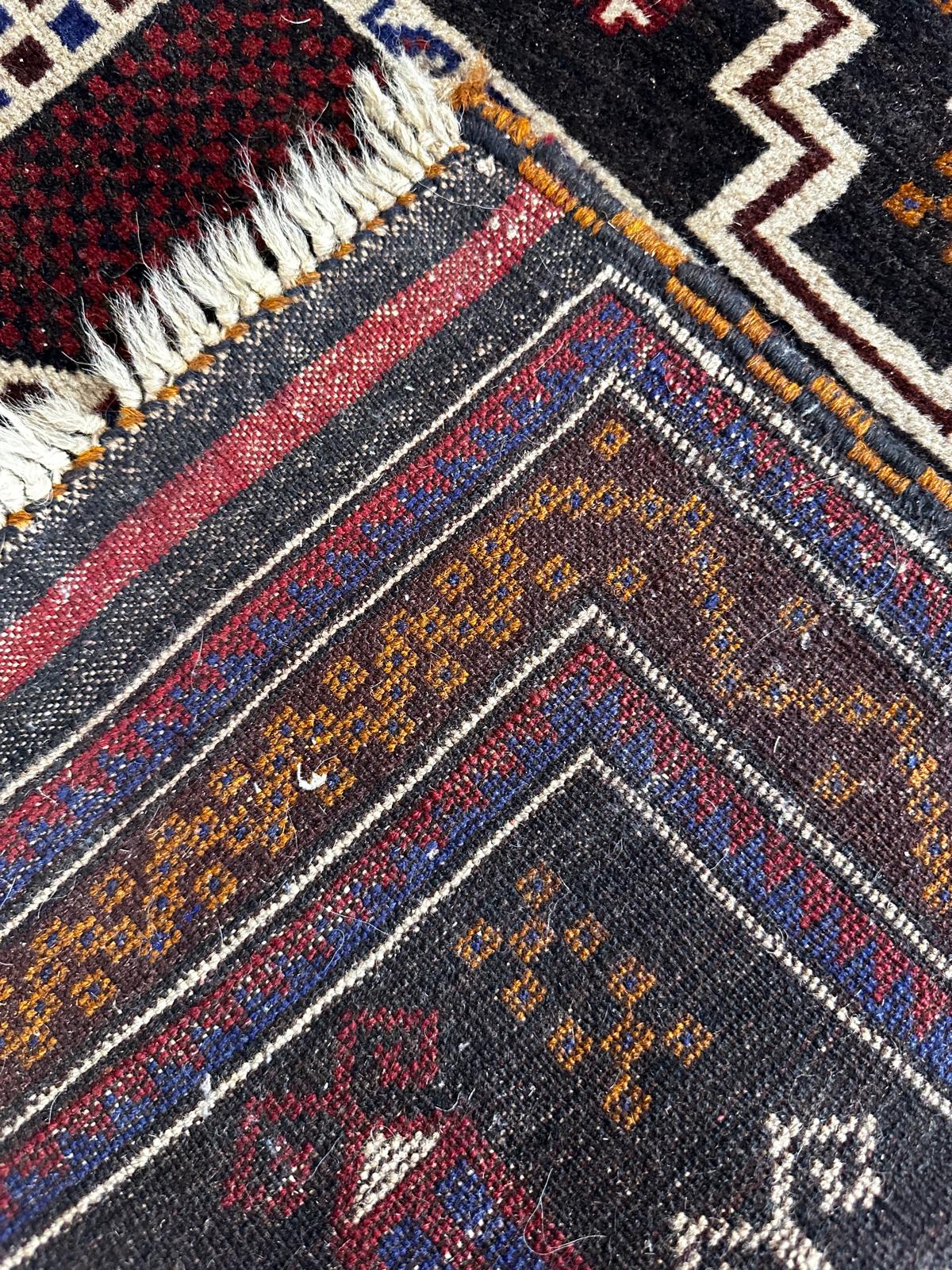 Tapis oriental fait main 160cm x 90cm