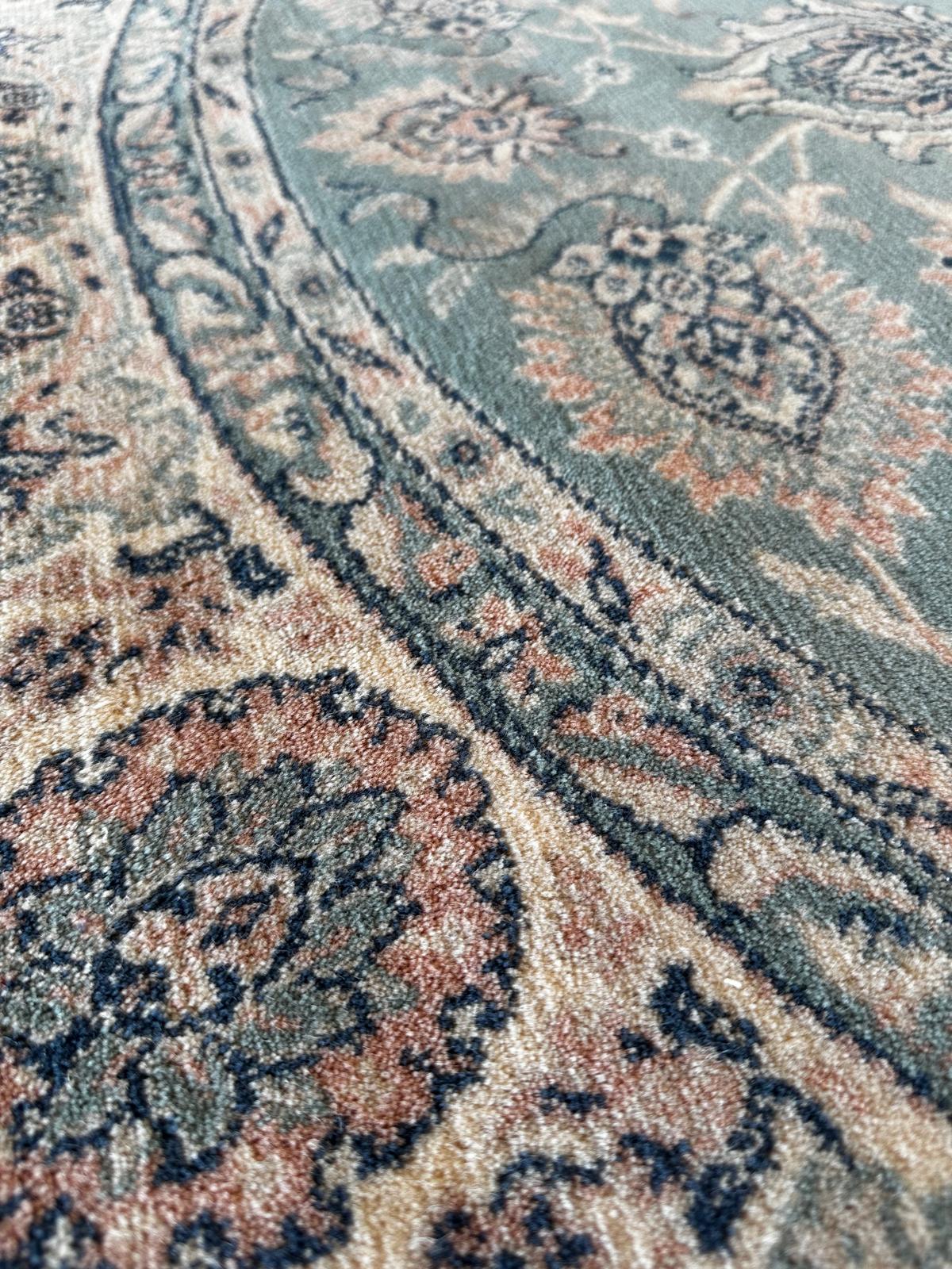 Grand tapis oriental rond 2m