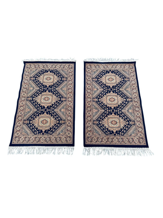 Paire de tapis orientaux 110cm x 70cm