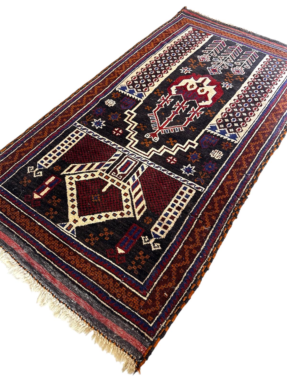 Tapis oriental fait main 160cm x 90cm