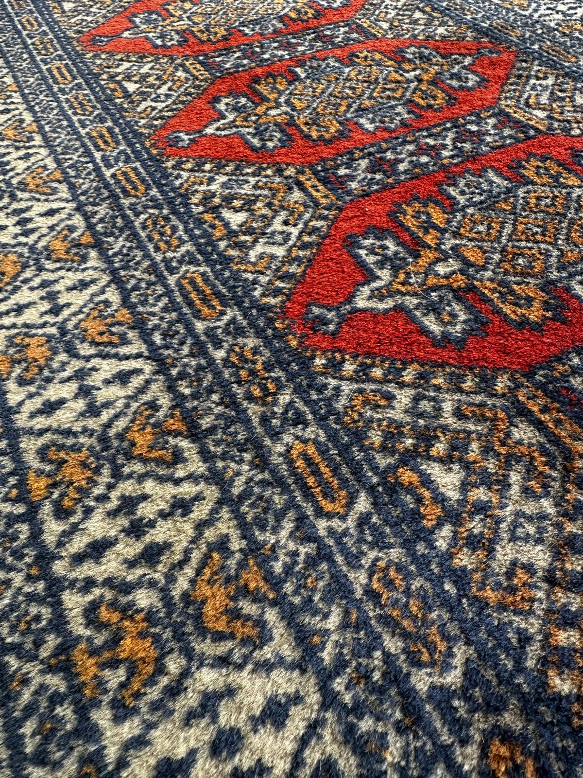 Tapis oriental 130cm x 60cm