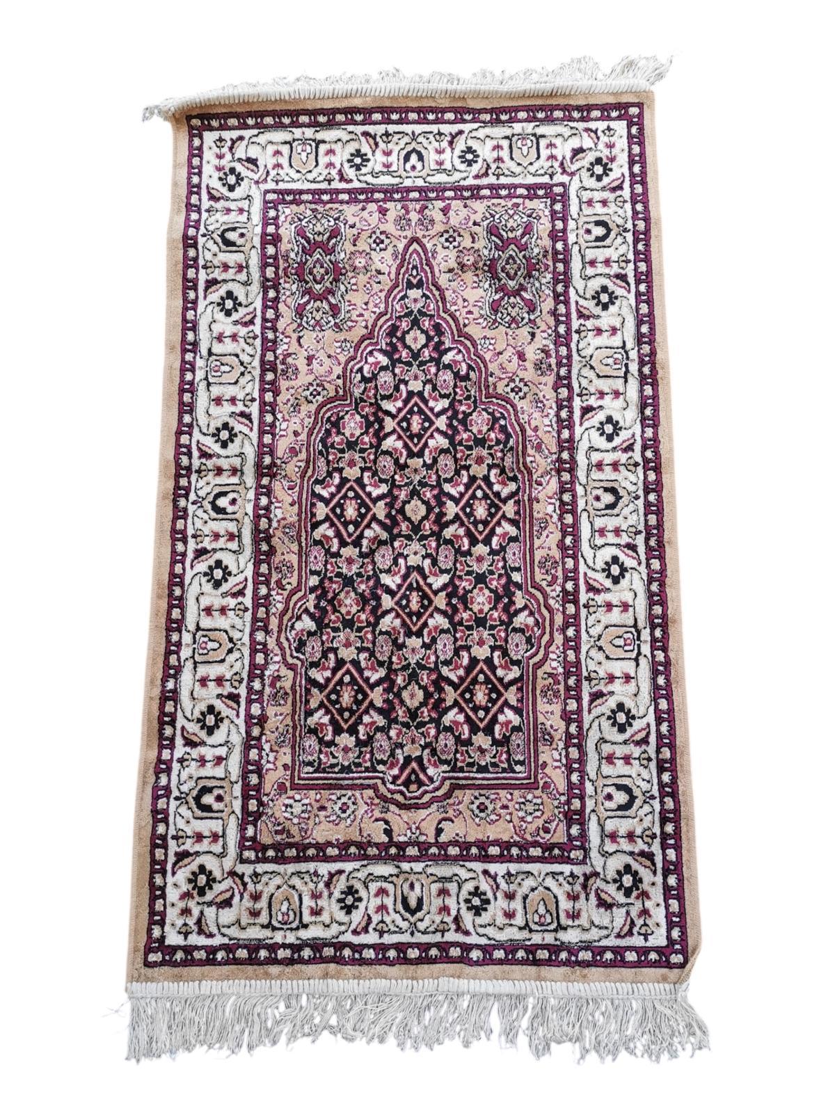 Tapis de style oriental 115cm x 65cm