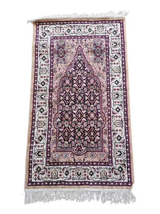 Tapis de style oriental 115cm x 65cm