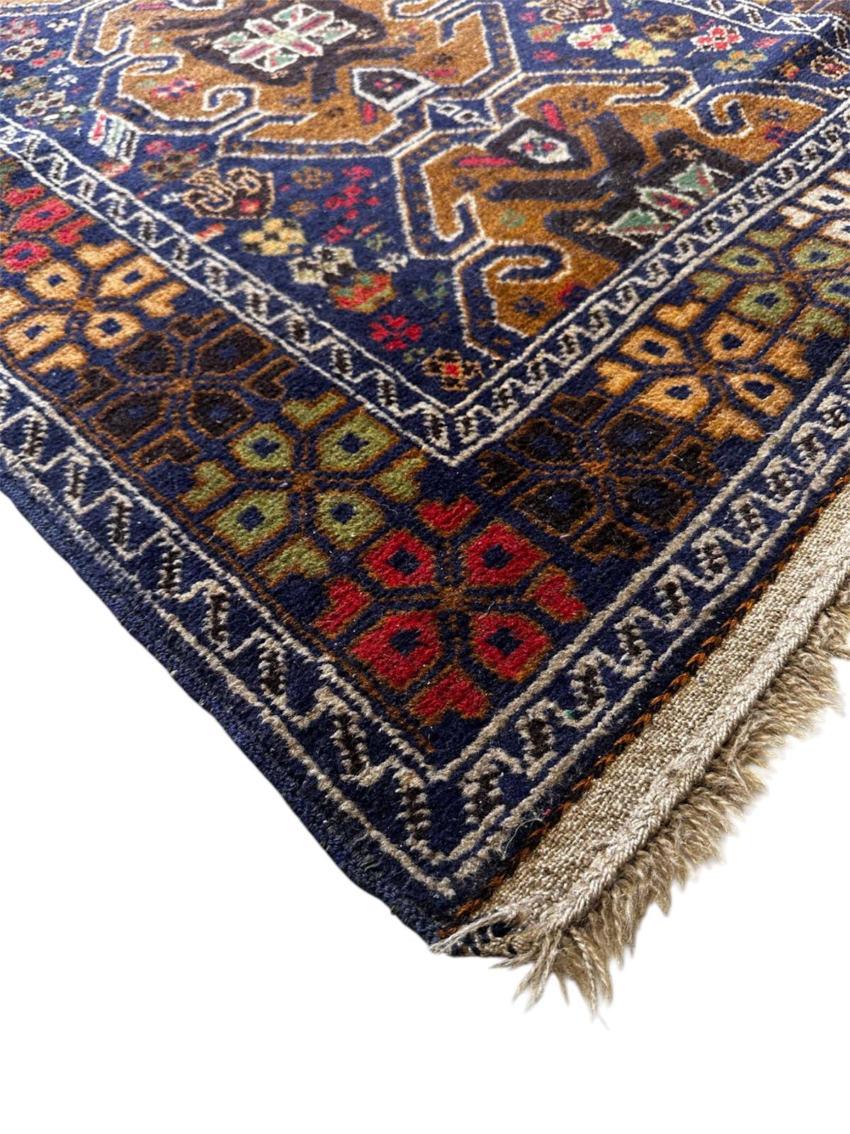 Tapis oriental fait main 160cm x 90cm
