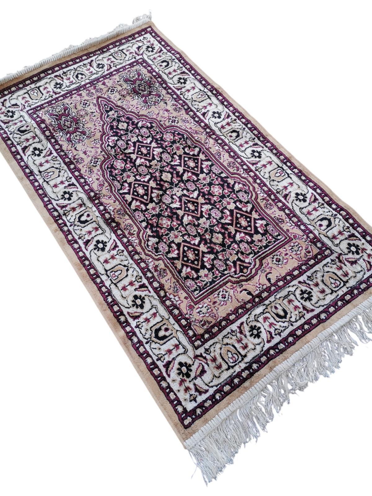 Tapis de style oriental 115cm x 65cm