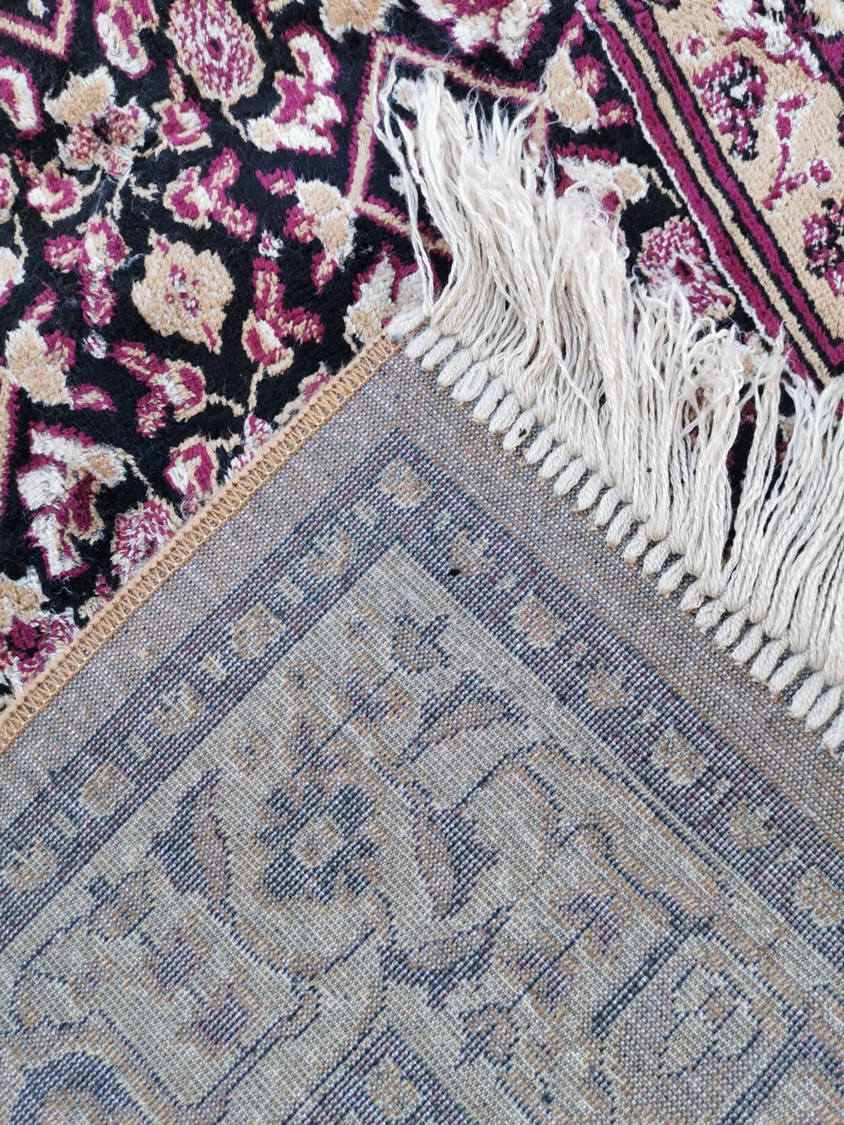 Tapis de style oriental 115cm x 65cm