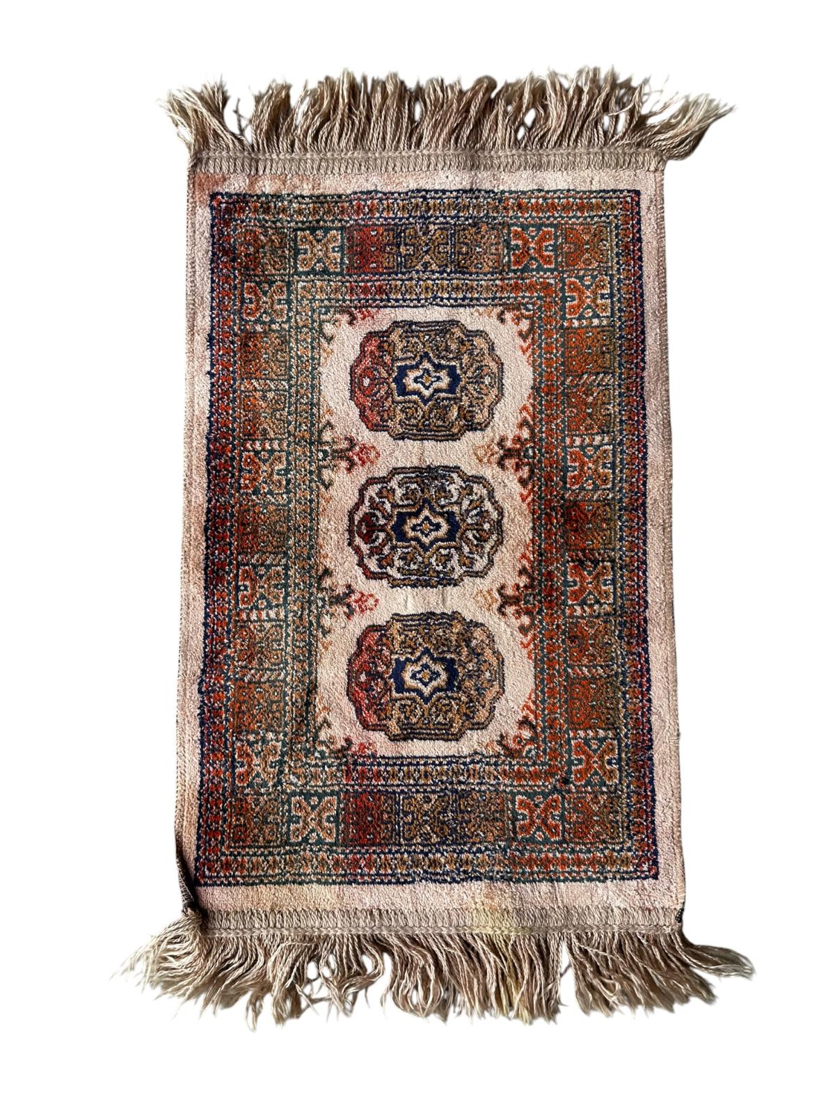 Tapis de style oriental 55cm x 34cm