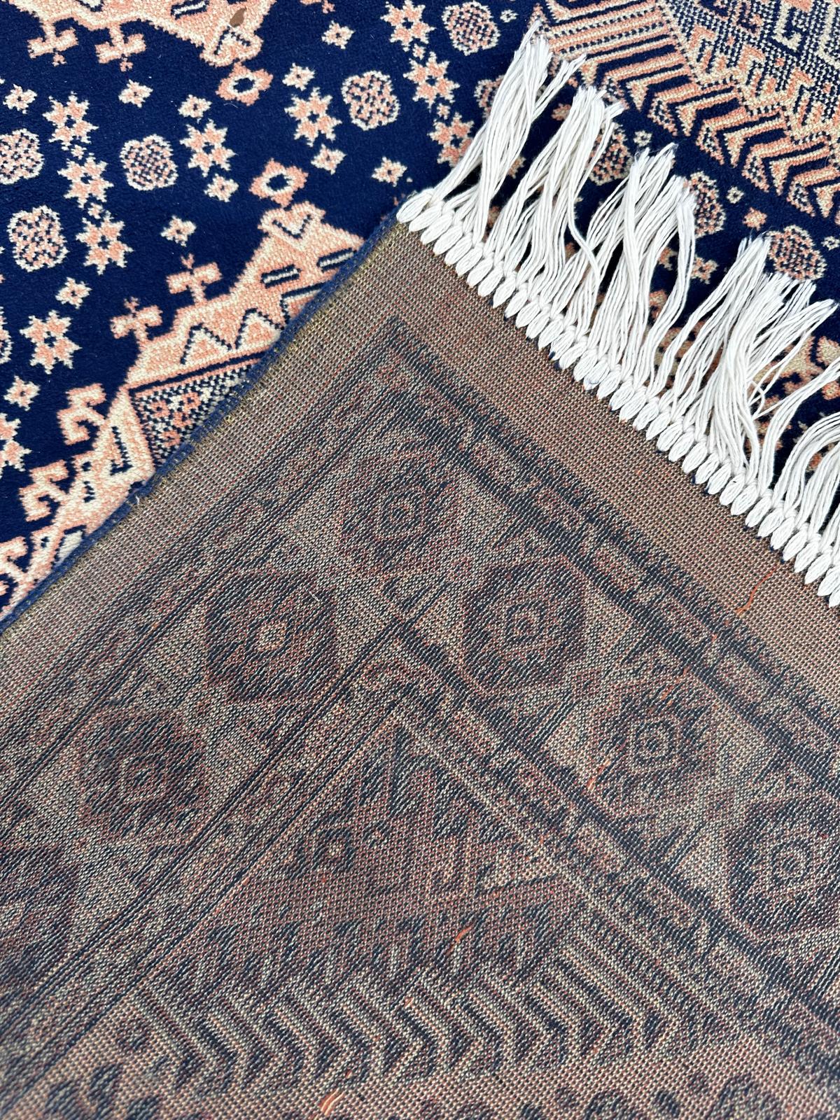 Paire de tapis orientaux 110cm x 70cm