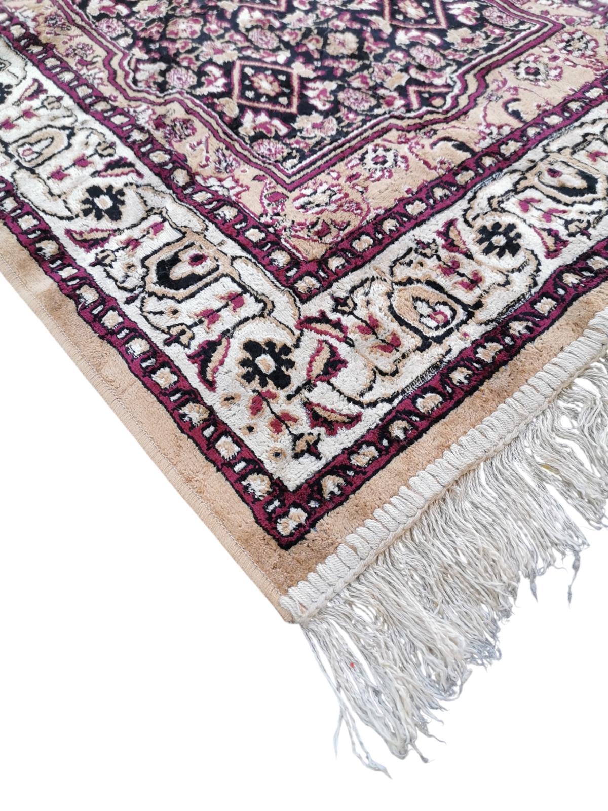 Tapis de style oriental 115cm x 65cm