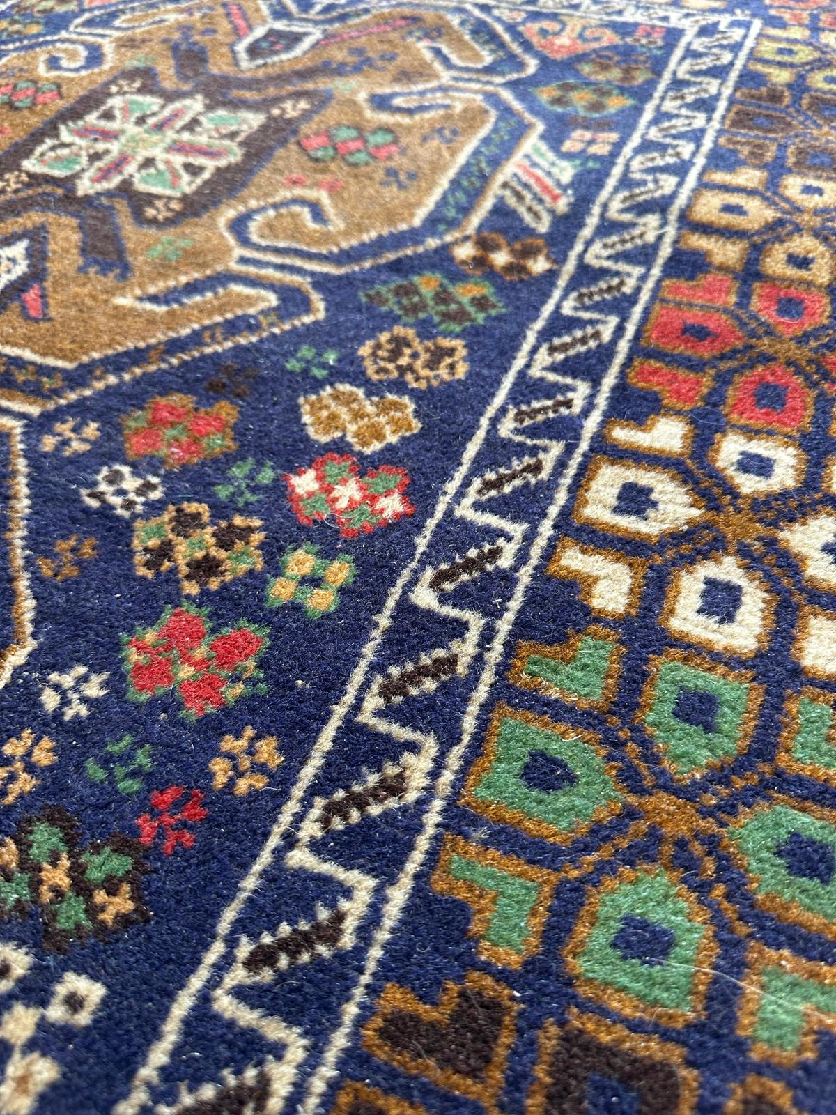 Tapis oriental fait main 160cm x 90cm